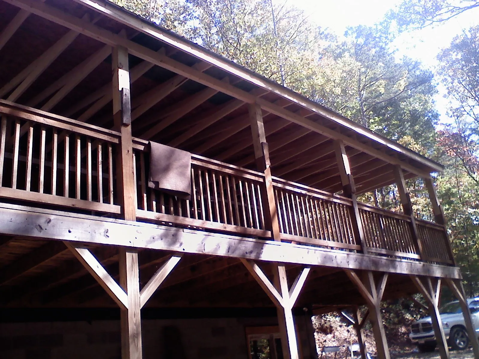 Timber framing under a new elevated porch and deck — Roof Leak Repair in Casstown by Roofing Brothers